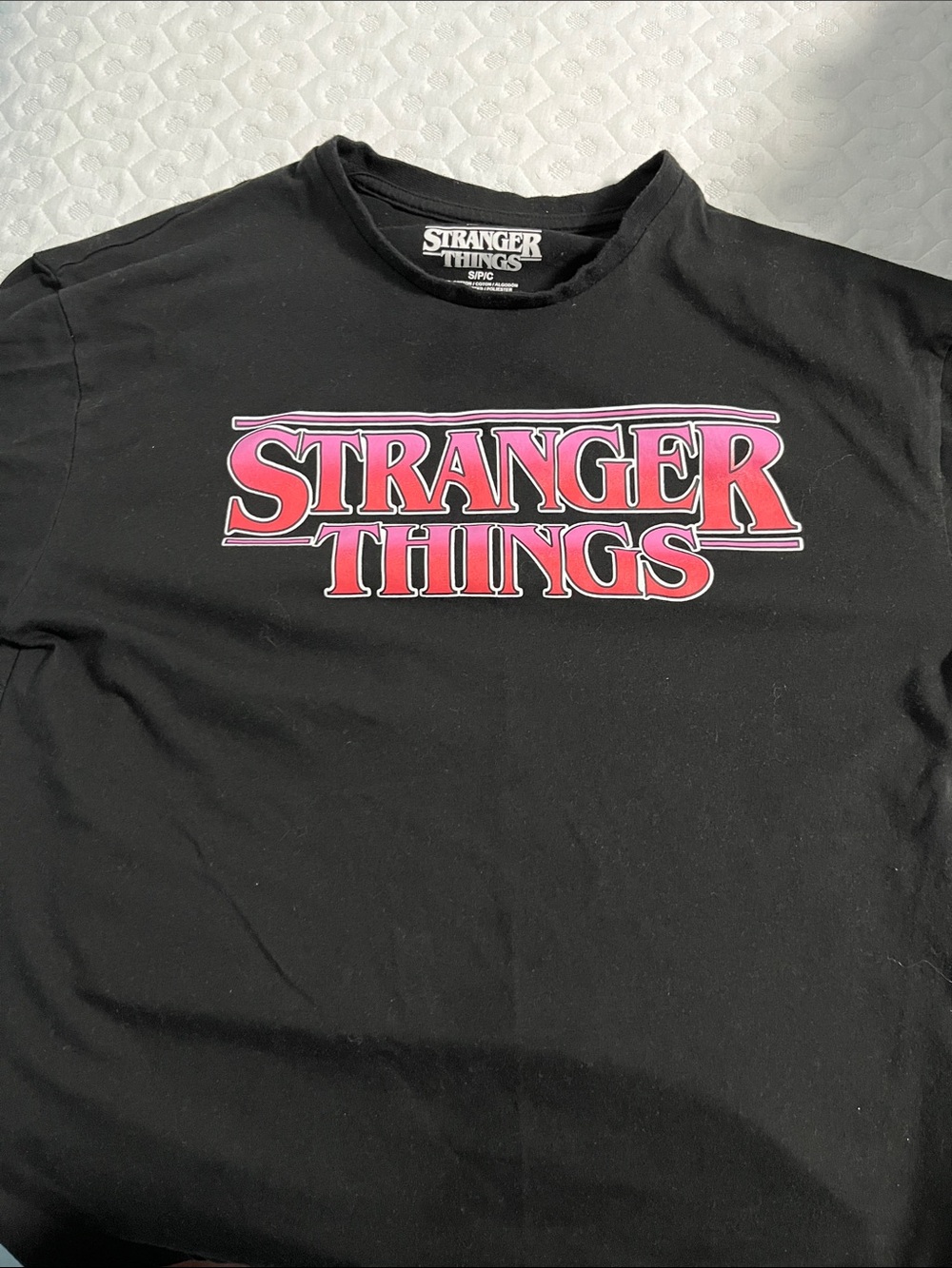 Urban Planet Black Tee with Pink/Red Stranger Things Logo